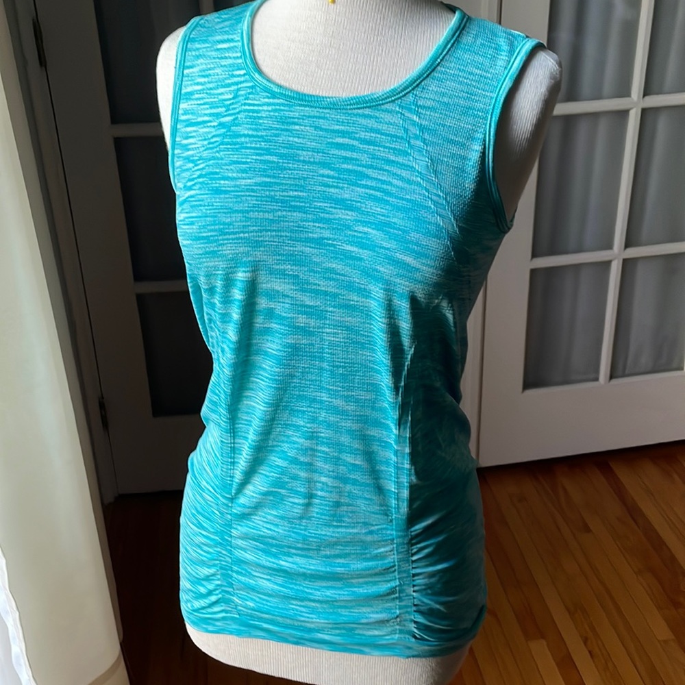 Athleta sleeveless top. Teal blue. Size Large.